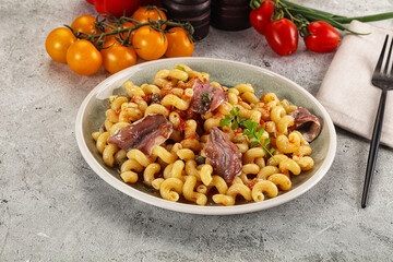Italian pasta cellentani with anchovy