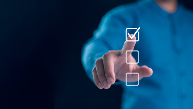 Business performance checklist, businessman using laptop doing online checklist survey, filling out digital form checklist, take an assessment, questionnaire, evaluation, online survey, online exam.