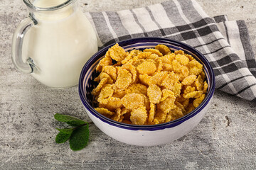 Corn flakes with milk for breakfast