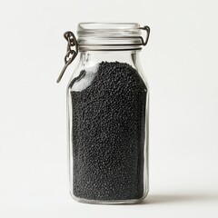 Glass jar filled with small, dark seeds