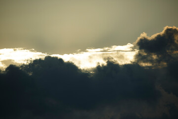 Dark clouds gathering over the horizon during twilight hours in a dramatic sky