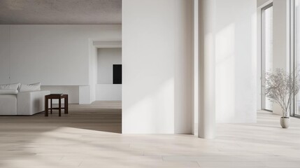 Modern and minimalist living room with white walls and flooring. the room has a large window on the right side, allowing natural light to enter the space.