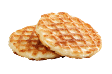 Two delicious golden brown waffles with crispy texture and soft center, cut out