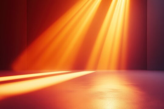 Bright golden beams of light illuminating a dark empty space