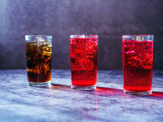 A lot of Soft drinks in colorful and flavorful glasses on the table,Glasses with sweet drinks with...