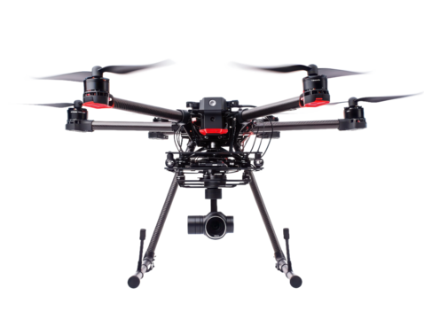 A detailed front view of a black drone with red accents against a black background in a studio shot