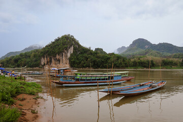 Exploring serene river life in Mekong Delta and lush landscapes of Laos