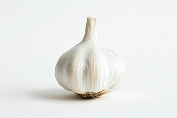 Close-up of a fresh garlic bulb on a plain background.