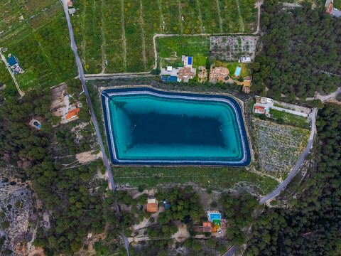 Aerial view of a pond filled with water for irrigation