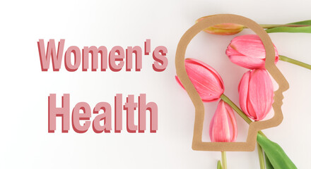 A head with pink flowers is on a white background. The head is cut out of a piece of cardboard and the flowers are arranged around it. The image is titled Women's Health.