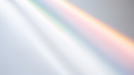 Soft rainbow light beam on clean surface ideal for spiritual visuals, abstract backgrounds, design overlays or dreamy concept art. Selective focus