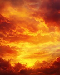 Fototapeta premium Dramatic sunset sky with vibrant orange and yellow clouds creating a fiery and intense atmosphere for background use