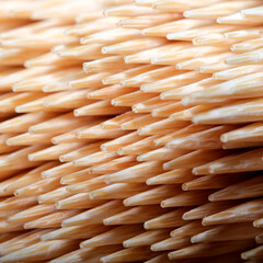 Unique arrangement of wooden toothpicks on a textured surface