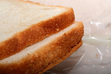 Freshly baked bread showcasing a golden crust and soft interior