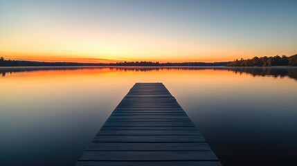 Fototapeta premium Peaceful Sunset Over a Tranquil Lake