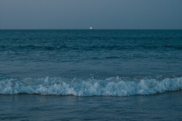 waves crashing on the beach