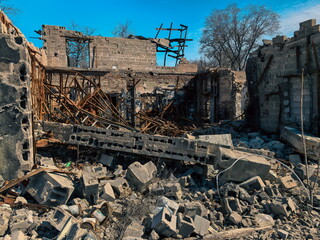 Fototapeta premium destroyed and burned houses in the city in Ukraine