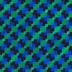 Illustration, background in the form of a seamless checkered pattern of blue, green and light blue squares on a dark background