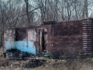 destroyed and burned houses in the city in Ukraine