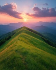 Fototapeta premium Scenic mountain ridge at sunset with vibrant sky and layered mountainscape evoking tranquility and natural beauty in a wide angle landscape