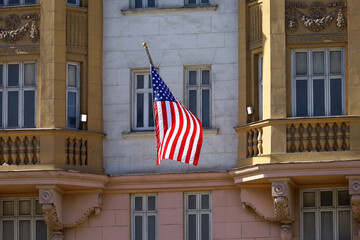American flag on US embassy facade in Moscow. Symbol of United State of America