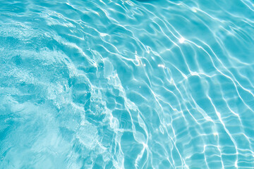 Obraz premium Water in swimming pool rippled water detail background.