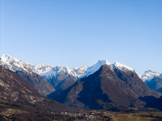 Aerial view of Alpine valley near the Soča River, Slovenia. Landscape with snow capped mountains