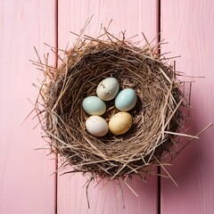 Pastel Easter Eggs in Bird's Nest on Pink Wooden Background