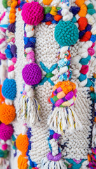  Close-up view of beautifully crafted tufted carpets showcasing intricate patterns, vibrant colors, and rich textures.