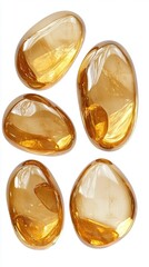 Amber glass pebbles on white background studio shot creating a warm inviting and natural mood perfect for wellness and spa concepts
