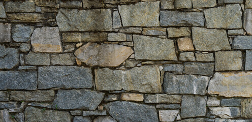 Stone wall texture background, dry stone wall