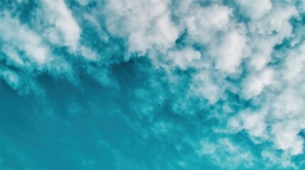 Obraz premium Clear Blue Sky with Scattered Clouds 