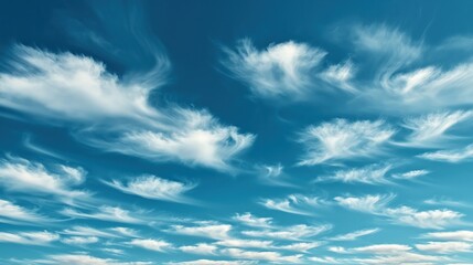 Clear Blue Sky with Scattered Clouds over a Desert Landscape  