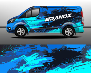Vector design of delivery van. Car sticker. Abstract blue paint splatter on dark gray background for racing livery or vinyl decal for everyday use car. Transport branding.