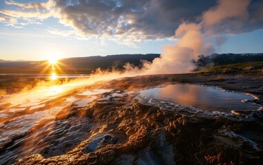 A stunning landscape featuring a geothermal area with steam rising, a reflective pond, and a vibrant sunset illuminating the scene.