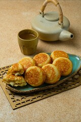 Kue kamir or Kamir or khamir cake on a oval plate. Perfect for recipe, article, catalogue or any...
