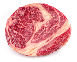 Raw ribeye steak isolated on white background.