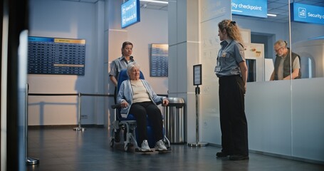 Security Checkpoint: Female TSA Officer Checking Elderly Woman Getting Up from Wheelchair in...