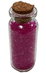  Glass jar with cork lid filled with pink beads