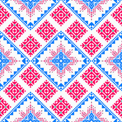 Delicate seamless vector pattern with geometric floral motifs in red, blue, and green on white. Perfect for textile design, wallpaper, interior decor, and craft projects with a traditional folk charm.