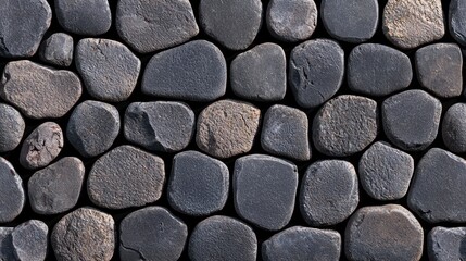 Stone wall texture with uneven shapes and patterns.