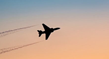 Fototapeta premium Sleek Jet Silhouette Against a Gradient Sky With Subtle Contrails