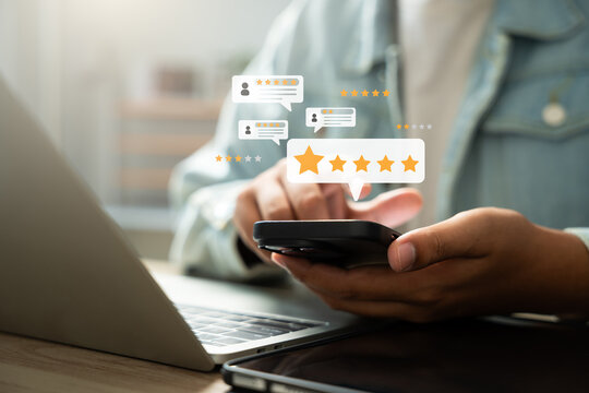 Customer satisfaction survey, Online feedback, Service rating, Users rate their experience with five-star review, Providing feedback on product quality and customer service through digital platform.