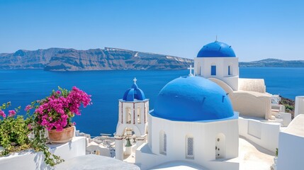 Fototapeta premium Stunning Santorini Coastal View with Blue Domed Churches and Flowers
