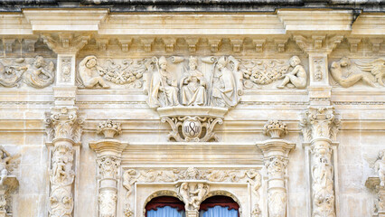 Medieval stone carving decorations in the facade of the Casa Consistorial, Seville, Spain