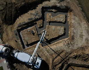 The concrete pump delivers the mixture through a pipe directly to the excavation or to the ceiling...