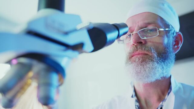 Professional scientist wearing lab coat examining sample through microscope in modern research laboratory, capturing focused scientific investigation across multiple frames