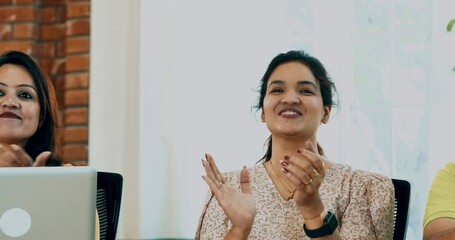 Indian Asian young business professionals or startup team clapping and applauding after an inspiring corporate talk, leadership lecture, or educational training session in a modern conference room