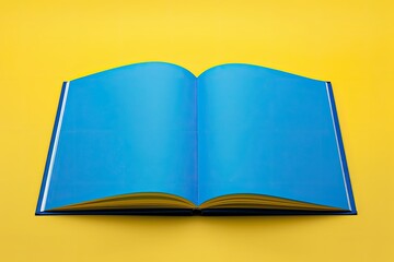 High Quality Image of Front View Open Blue Copybook Blank Paper on Yellow Blue Surface