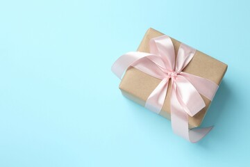 Beautiful gift box on color background
